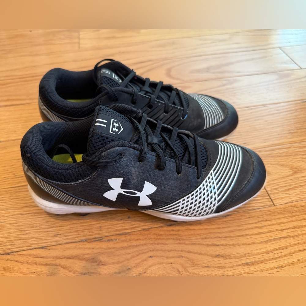 Under Armour baseball cleats black and white